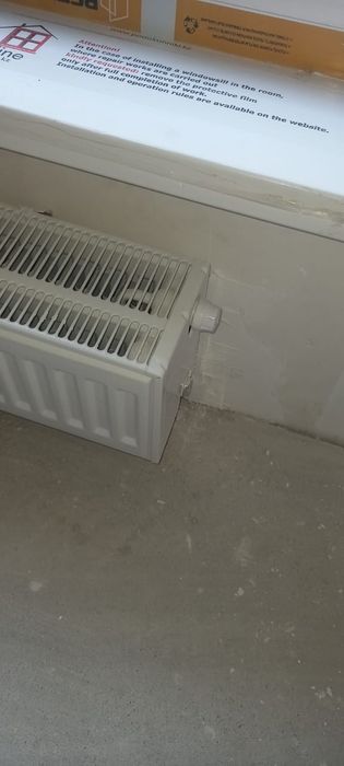 Настенное крепление панельных радиаторов