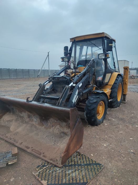 Продам Трактор 3в1 CAT 428C