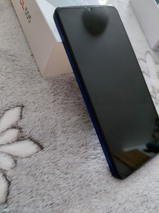 Телефон TCL 509K