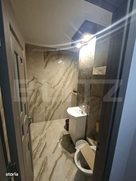 Garsoniera complet renovata de vanzare