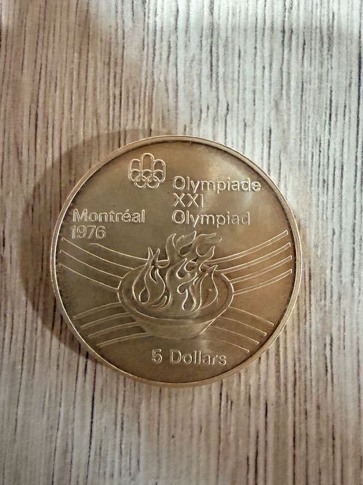 “Flacara Olimpica” moneda de 5 dolari din 1976 de la olimpiada de vara