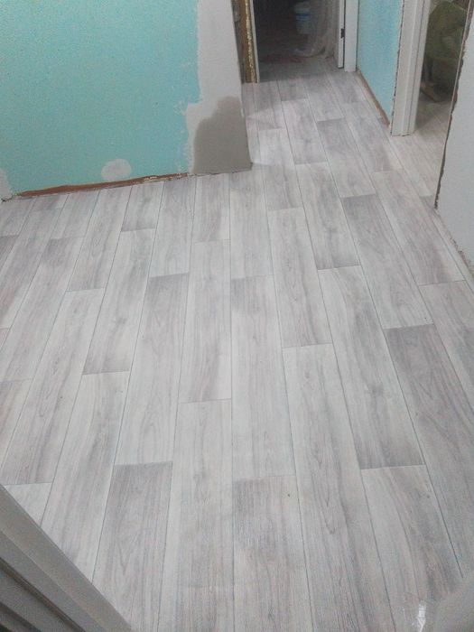 Укладка линолеума, ламината.