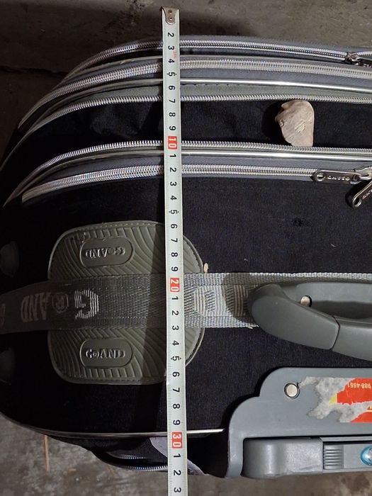 Пътнически куфар с колелца