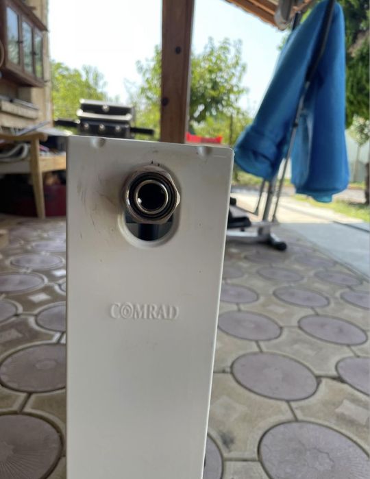 Котел с радиатори на пилети и дърва