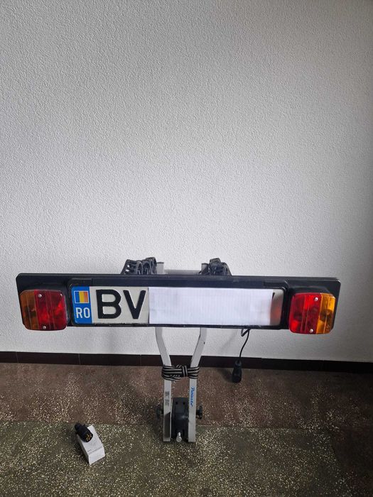 Suport Peruzzo 4 biciclete cu  prindere pe  carlig