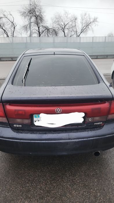 Автомобиль мазда кронос