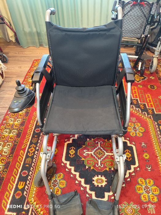 Инвалидная коляска с электроприводом