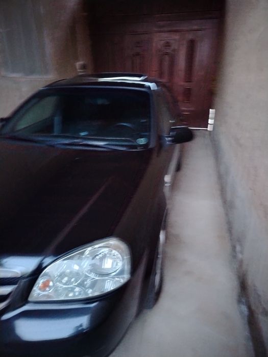 Lasetti 1.8 yili 2011 aftamat karopka