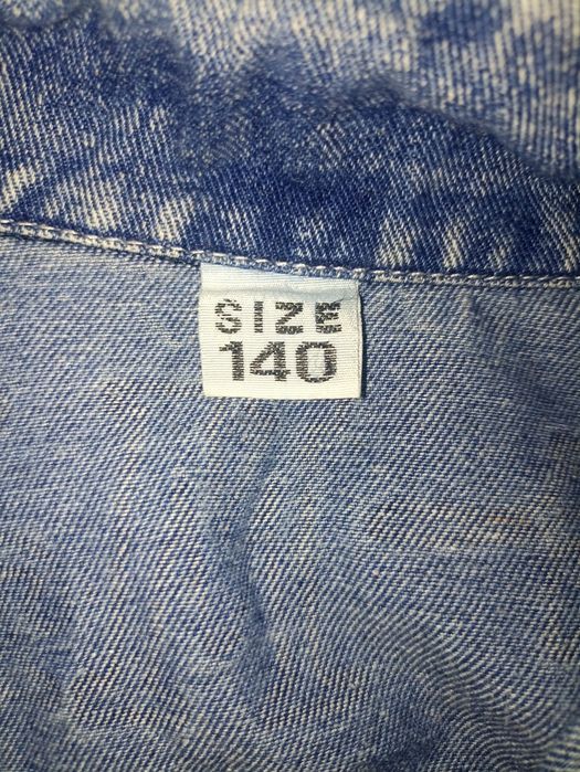 Продам джинсовку р140 8-9 л