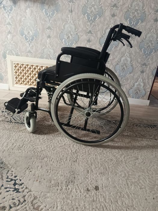 Инвалидная коляска