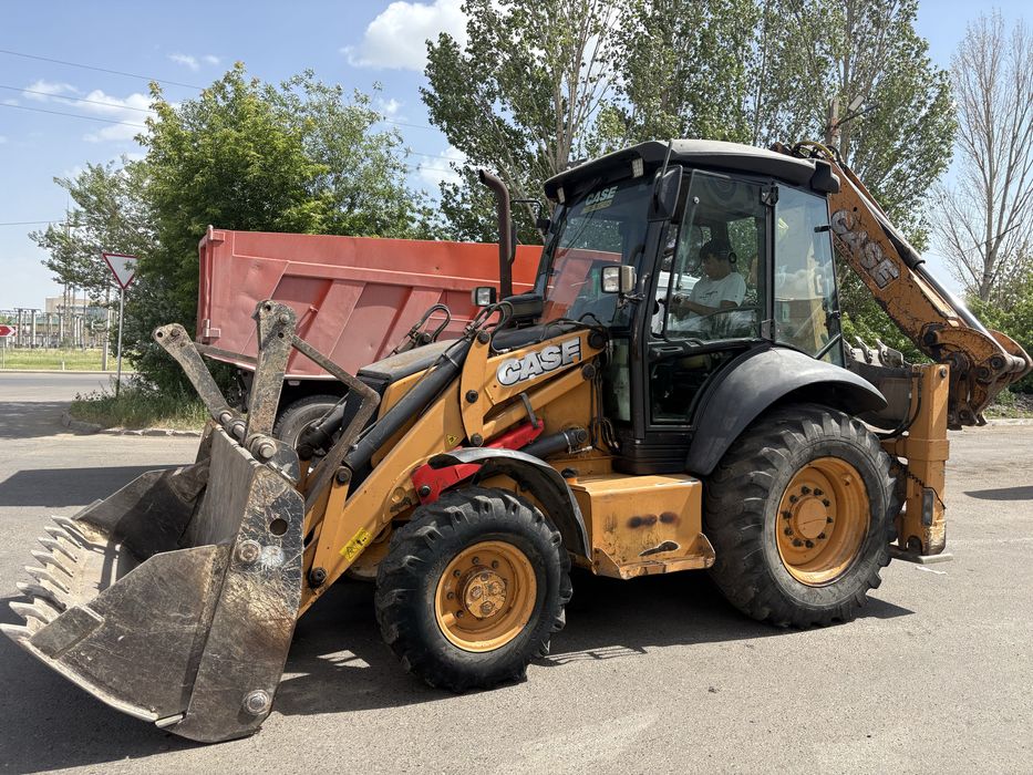 Продам Эксковатор погрузчик 3в1 петушок