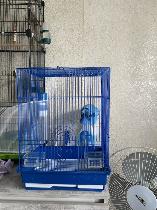 Клетка для птиц синего цвета