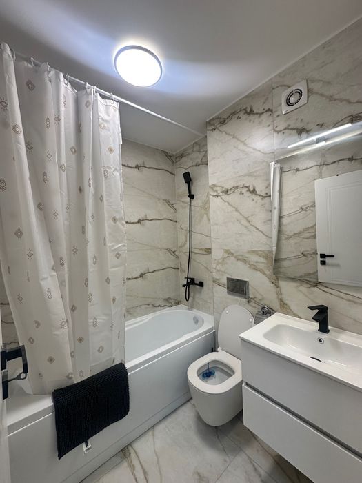 Prima inchiriere - apartament modern, curte proprie, parcare