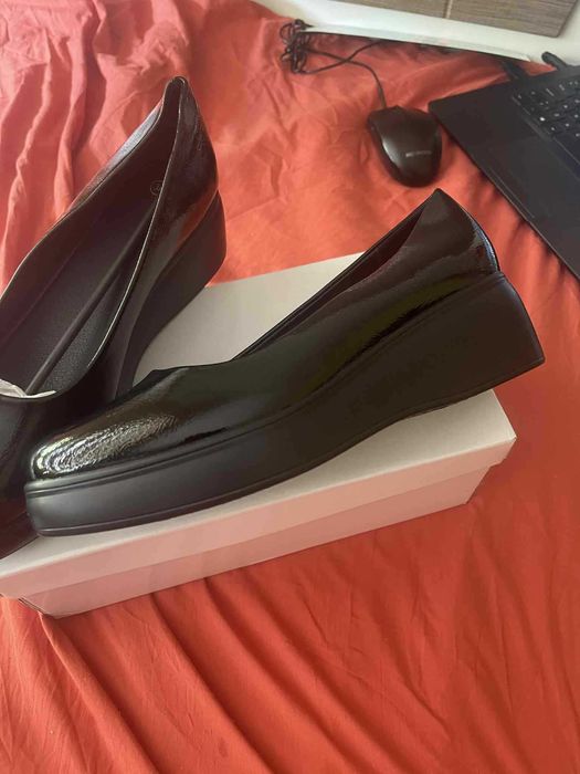 Нови обувки от еко кожа