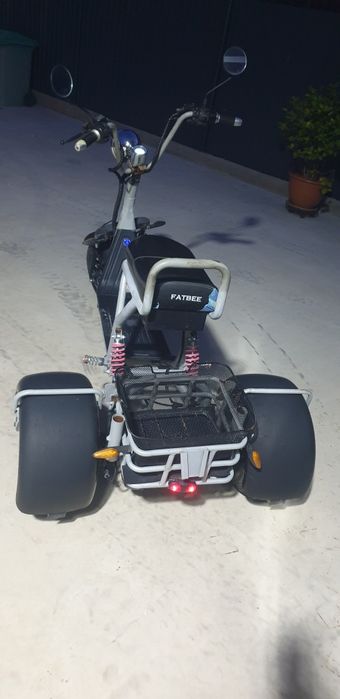 Scuter  electric trei roți