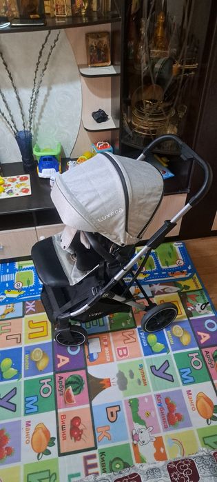 Продаётся прогулочная коляска luxmom.