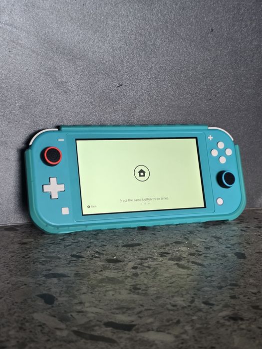Конзола Nintendo Switch Lite + 9 игри и пълен комплекm akcecoapu