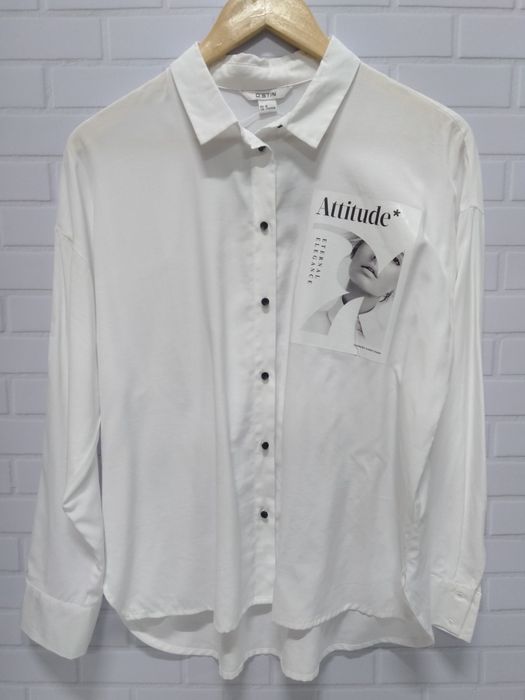 Продам рубашку новую белого цвета