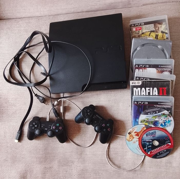 Play Station 3 + 10 дисков, 2 джойстика.