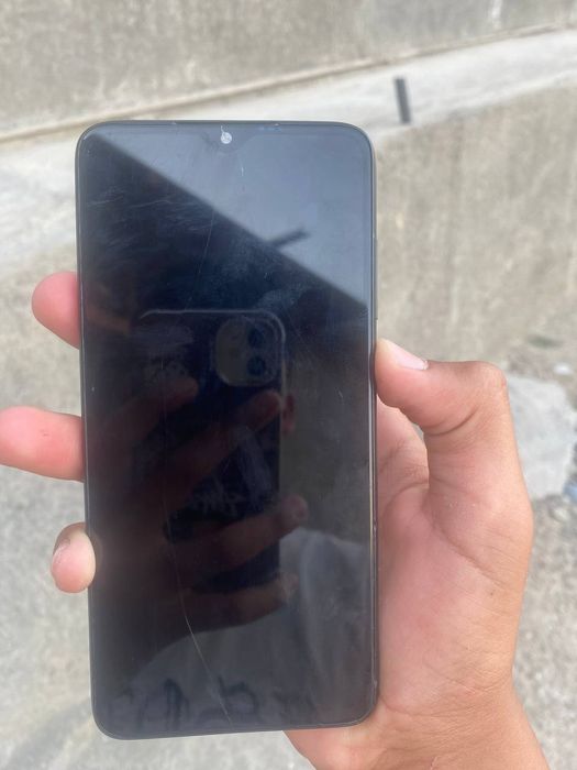 Xiomi redmi not 8 pro aybi rasmda sensir almashgan