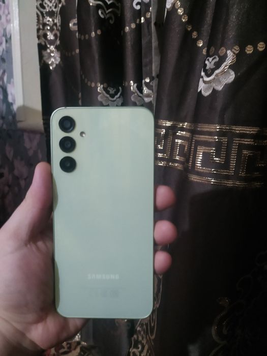 Samsung a24 6/128tali bir qol ishlatilgan xolati alo Karopka dakument