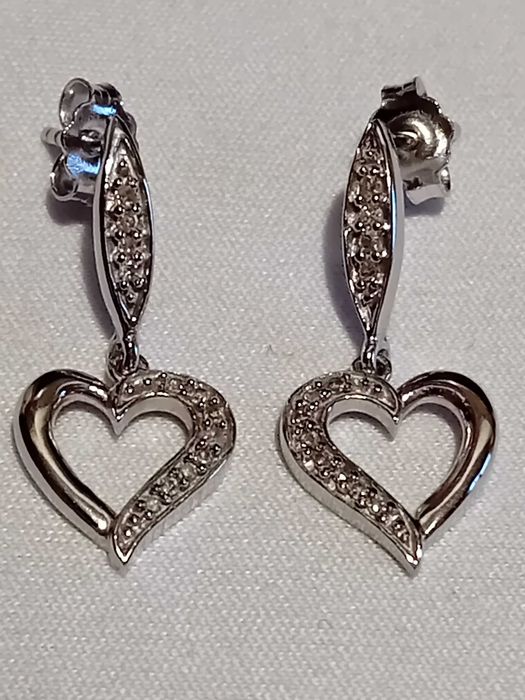 Златни обеци сърца с диаманти