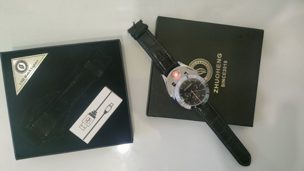 Часы зажигалка продам