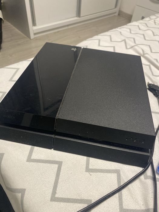Ps 4 Slim cu 5 cv-ri de jocuri