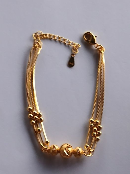 Brățară de dama ,plăcută cu aur 18k