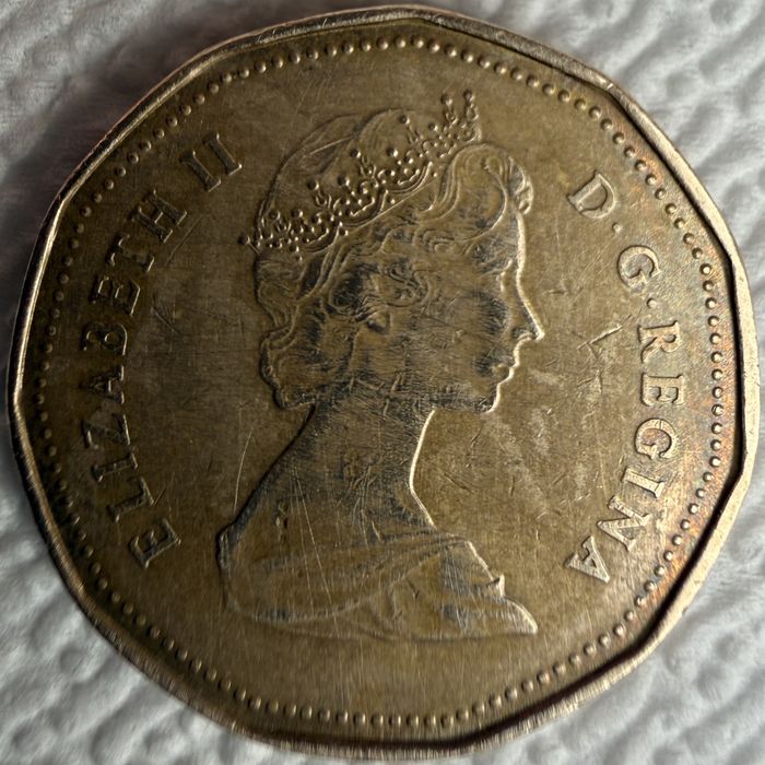 (“Loonie”), anul 1987 — prima ediție loonie.