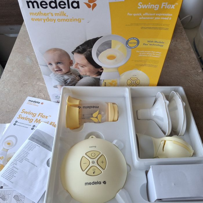 Помпа за кърмачета Medela + подарък шишета с биберони