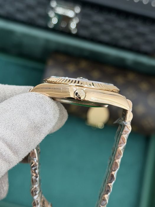 Rolex Day-Date 40 Baguette Eisenkiesel