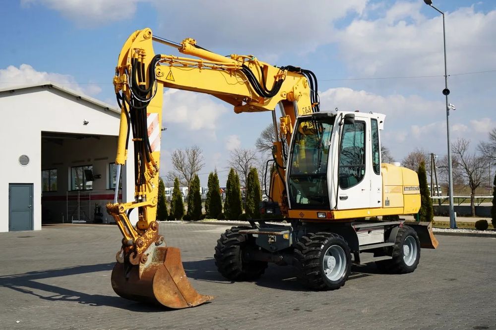 Liebherr A314 LITRONIC / EXCAVATOR PE ROȚI / AER CONDIȚIONAT /