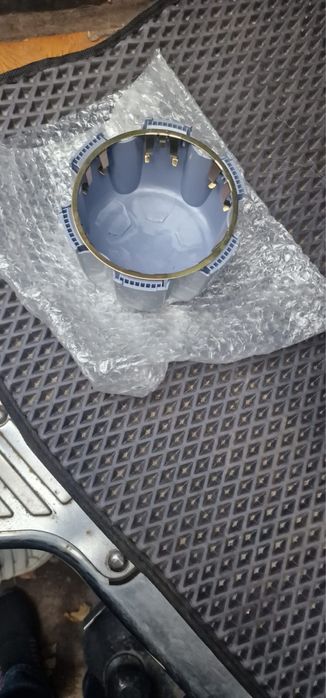 Продам колпаки на Мицубиси  4 штуки