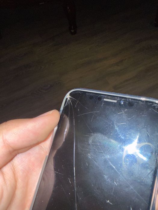 iPhone X 64 GB 100%