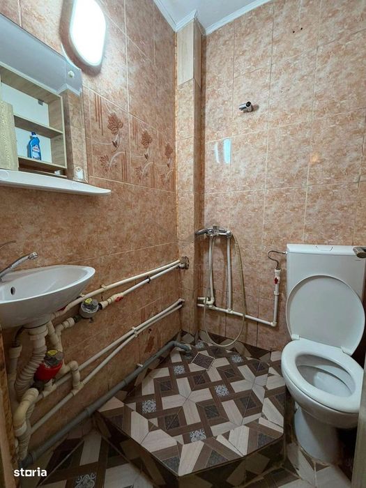 Garsoniera in bloc de apartamente Podu Ros