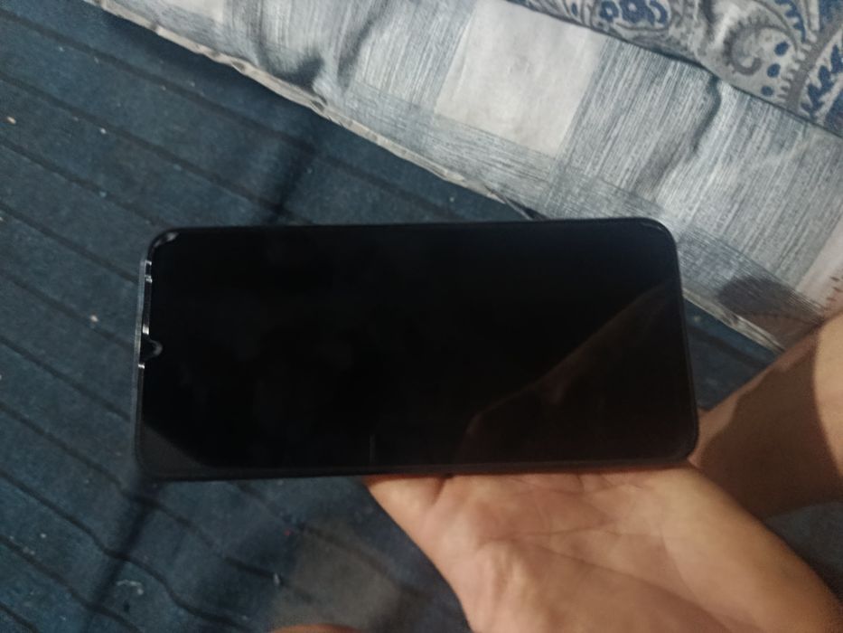 Xiaomi HyperOS.  Redmi 15 C