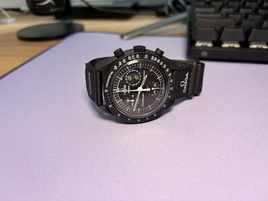Omega Swatch Moonswatch mission to Moonphase Snoopy Black