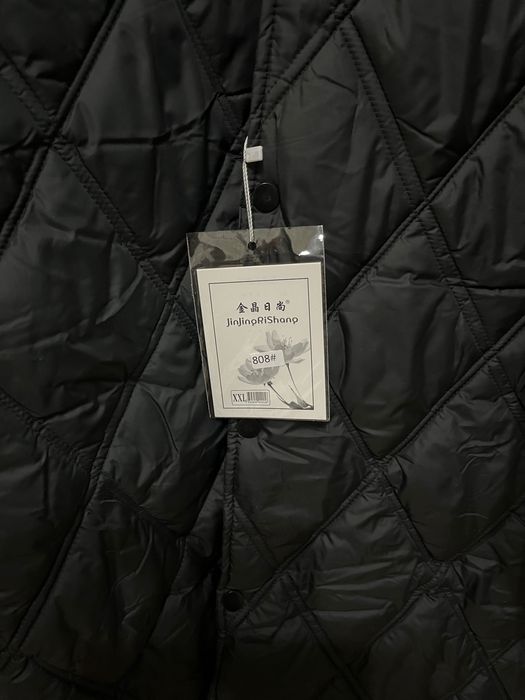 Женский пуховик 52-54