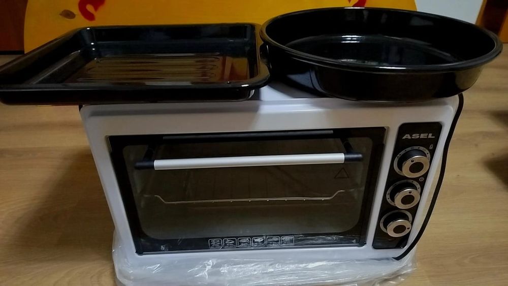 Продам Печь-Духовку б/У в отличном состоянии.