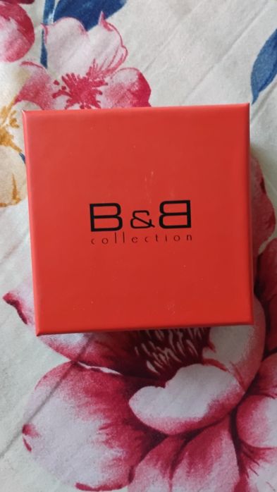 Vând brățară de culoare argintie