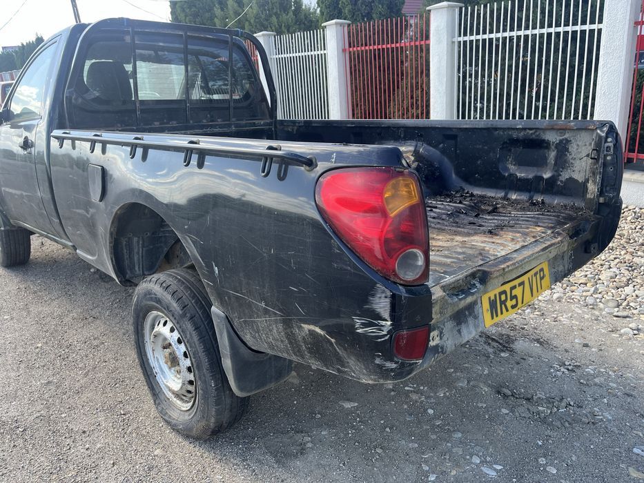 piese mitsubishi l200 capota far bara grup cutie jante punte