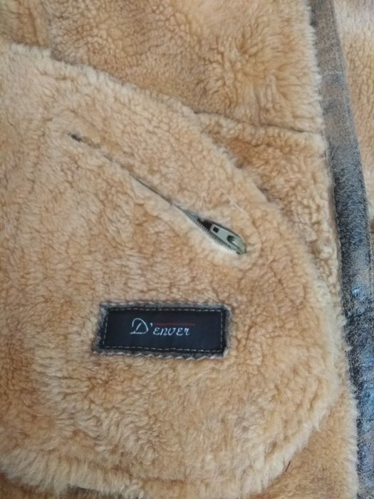 Дублёнка тёплая, тигрового цвета.