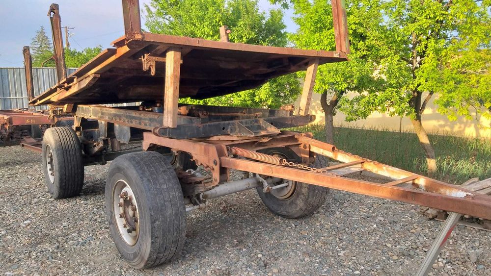 Remorca 12 tone, cu un  cilindru, basculare pe trei parti