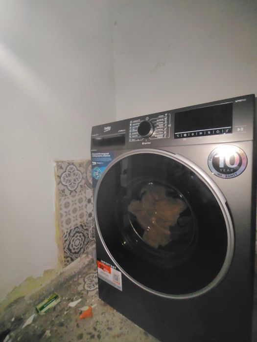 Mașină de spălat rufe Beko cu uscător incorporat