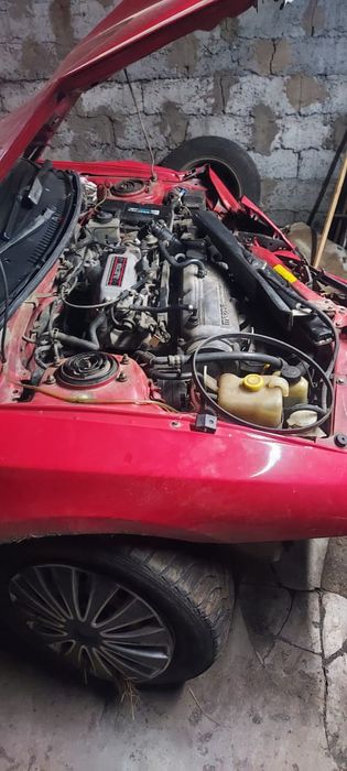 Mazda 323 красная