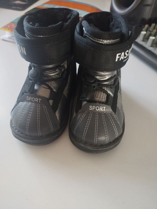 Продам новые зимние ботинки