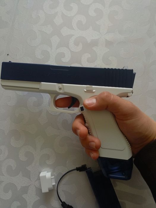 водяной пистолет игрушечный