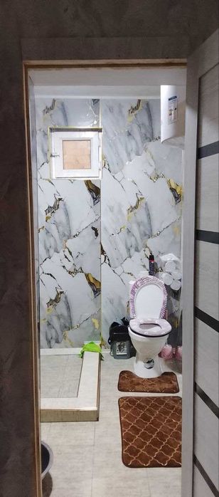 Yangibozor oldida xovlili uy sotiladi