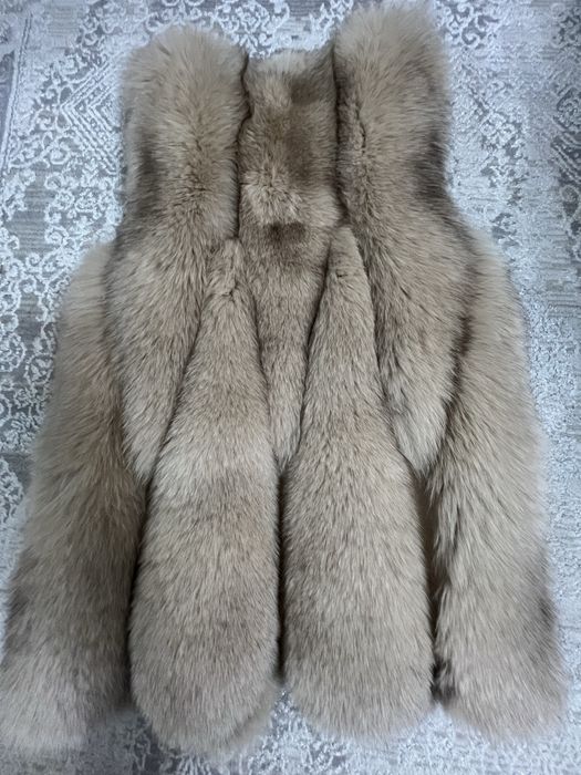 Продам меховую жилетку